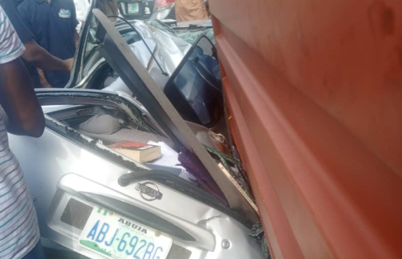 Lagos state- Woman dies as container crushes car