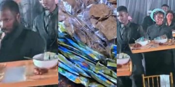 Nigerian couples serve garri and kulikuli at wedding reception