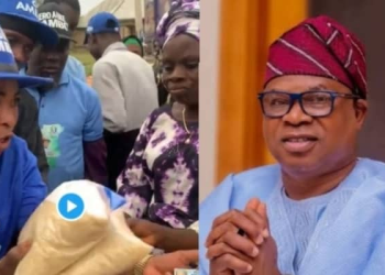 Osun APC Mobiliser Shares Rice, Rains Curse on Voters Who Reject Oyebamiji