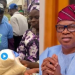 Osun APC Mobiliser Shares Rice, Rains Curse on Voters Who Reject Oyebamiji